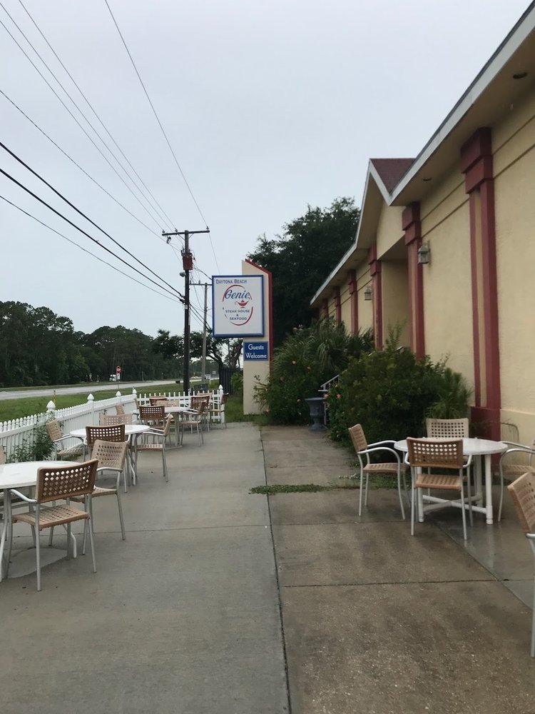 Genie Steak House and Seafood Logo