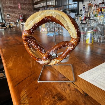 Guilford Hall Brewery - House Pretzel with mustard and cheese - Breweries Near Me - Baltimore, Maryland Guilford Hall Brewery - House Pretzel with mustard and cheese - Breweries Near Me - Baltimore, Maryland