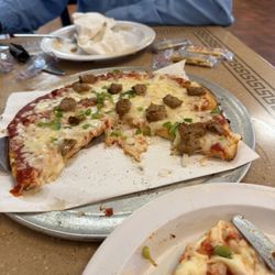 Majestic Family Restaraunt - My terrible quality pizza at Majestic's in Mayfield, Ky that apparently has a frozen crust & raw topping that