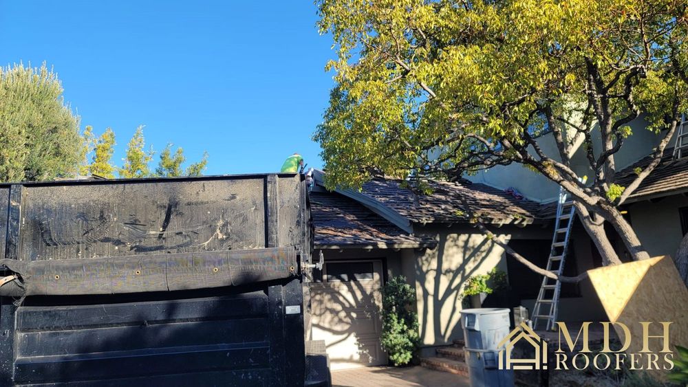 Slide of MDH Roofers