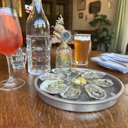 Happy Hour Oysters, half off drafts!