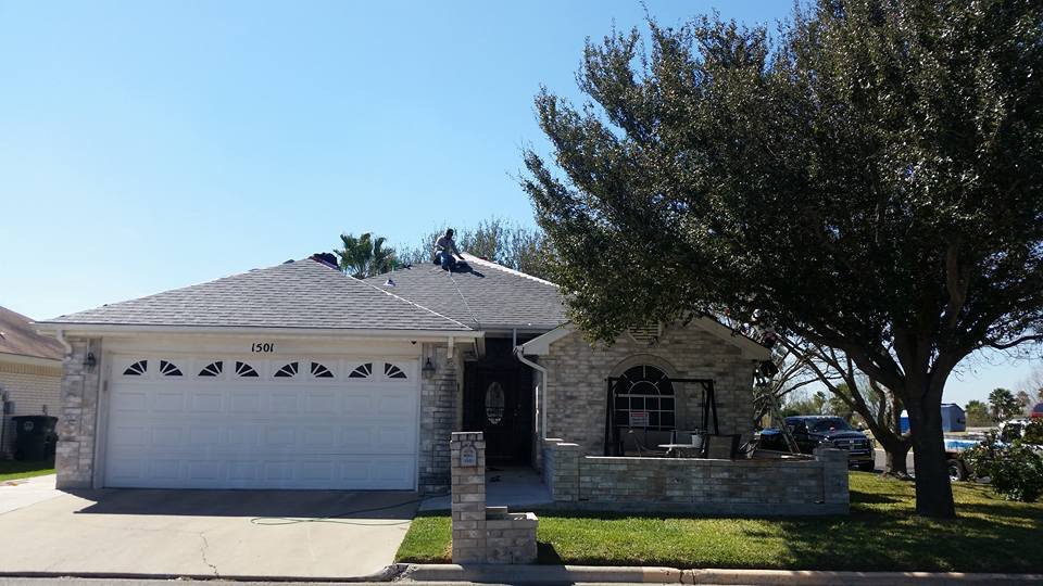 Slide of Vela's Roofing and Construction