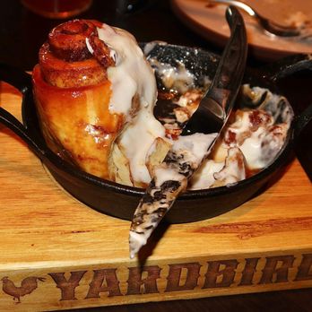 Yardbird - Massive and served in a cast iron skillet (perfect for sharing). The roll was densely fluffy with gooey cinnamon filling - Whiskey Bars Near Me - Denver, Colorado Yardbird - Massive and served in a cast iron skillet (perfect for sharing). The roll was densely fluffy with gooey cinnamon filling - Whiskey Bars Near Me - Denver, Colorado