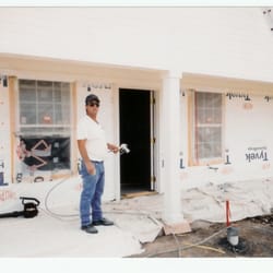 Burkleo Home Improvement / Pro Painting - painting the exterior of a new home