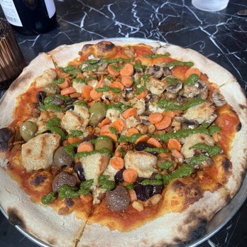 Fire and Brimstone - Uprooted vegan plant based pie with diced raw crunchy carrots. lol No cauliflower because they were out, sub olives and mushrooms. - Pizza Near Me - Gilbert, Arizona Fire and Brimstone - Uprooted vegan plant based pie with diced raw crunchy carrots. lol No cauliflower because they were out, sub olives and mushrooms. - Pizza Near Me - Gilbert, Arizona