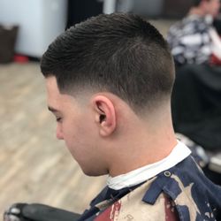 Mica D's Barber Shop - Skin Taper. Work by Joe.