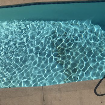 Resort Realty - Sand and pollen in pool - Property Management Near Me - Nags Head, North Carolina