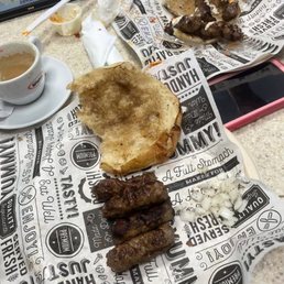 Full portion of cevapi wiyh onion, kajmak and ajvar