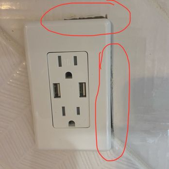 Signature Stone - Their cut was too large resulting in these gaps after installing the outlets. - Countertop Installation Near Me - Las Vegas, Nevada