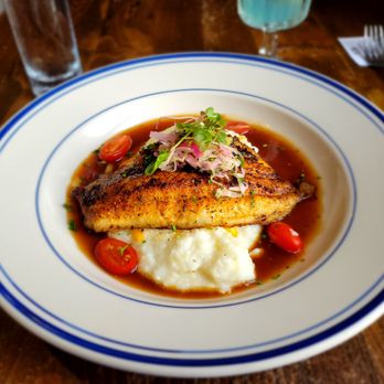 Lucille's - Catfish and Grits in an Oxtail Jus - New American Near Me - Houston, Texas Lucille's - Catfish and Grits in an Oxtail Jus - New American Near Me - Houston, Texas