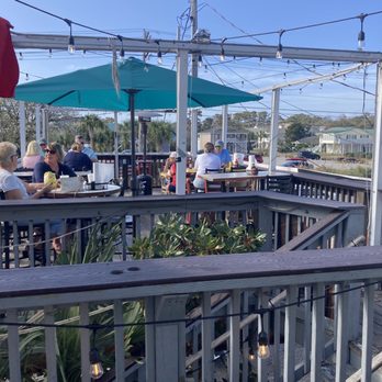Duck Dive Bar And Grill - The deck. Last hurricane took the roof off the deck. - Dive Bars Near Me - North Myrtle Beach, South Carolina