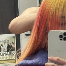 From red hair dyed blue and black, then bleached twice to reduce red and dye gray