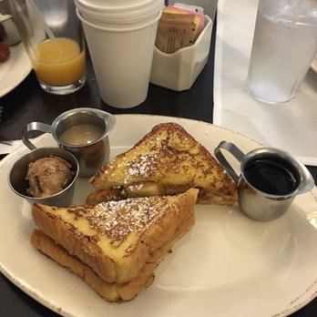 Syrup Downtown - Elvis French toast with pecan butter on left and buttermilk and maple syrup. - Breakfast & Brunch Near Me - Denver, Colorado Syrup Downtown - Elvis French toast with pecan butter on left and buttermilk and maple syrup. - Breakfast & Brunch Near Me - Denver, Colorado