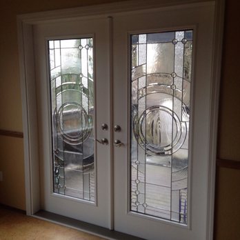 Polar Bear Exterior Solutions - New French doors leading from living room to deck - Windows Installation Near Me - Mukilteo, Washington Polar Bear Exterior Solutions - New French doors leading from living room to deck - Windows Installation Near Me - Mukilteo, Washington