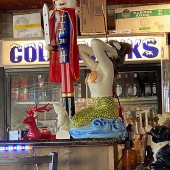 Sirenitas Restaurant - Eclectic combination of Christmas, mermaid, and little restaurant guy statue. - Mexican Near Me - Long Beach, California Sirenitas Restaurant - Eclectic combination of Christmas, mermaid, and little restaurant guy statue. - Mexican Near Me - Long Beach, California