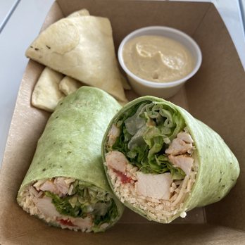 Bee Healthy Cafe - Edmond - Pecan Chicken wrap with a side of hummus and pita - Salad Near Me - Edmond, Oklahoma Bee Healthy Cafe - Edmond - Pecan Chicken wrap with a side of hummus and pita - Salad Near Me - Edmond, Oklahoma