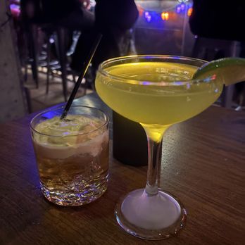 Lost Cat Bar & Bites - Thai Tea Milk Punch (left) and Manila to Tokyo (right) - Cocktail Bars Near Me - San Francisco, California Lost Cat Bar & Bites - Thai Tea Milk Punch (left) and Manila to Tokyo (right) - Cocktail Bars Near Me - San Francisco, California