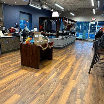 Dancing Goats Coffee - a man sitting at a counter - Coffee & Tea Near Me - Decatur, Georgia Dancing Goats Coffee - a man sitting at a counter - Coffee & Tea Near Me - Decatur, Georgia