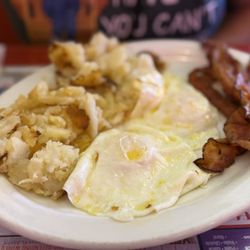 Uncle Joe's New York Diner - 2 over medium eggs with bacon and potatoes
