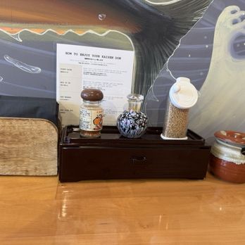 Don Maguro - Yuzu pepper, shoyu, sesame seed grinder and ginger. Chopsticks inside the black box - Japanese Near Me - San Diego, California