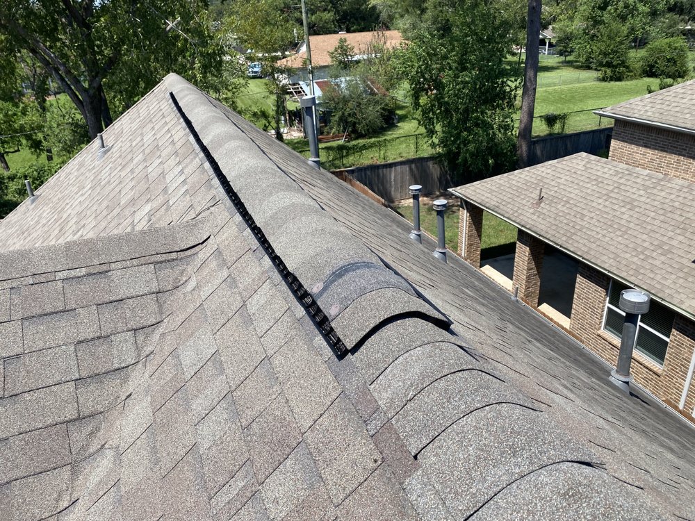 Slide of SNT Roofing And Construction