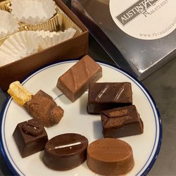 Austintacious - The sampler of truffles: dark chocolate, milk chocolate, hazelnut, coconut cream, cappuccino, Kona coffee, candied orange peel.
