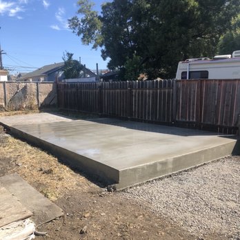 Solid Ground Masonry and Concrete - AFTER: completed resurfaced foundation now a raised patio - Masonry/Concrete Near Me