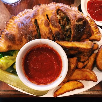 Knob Hill Tavern - Calzone with side of wedges - Bars Near Me - Newburgh, Indiana Knob Hill Tavern - Calzone with side of wedges - Bars Near Me - Newburgh, Indiana