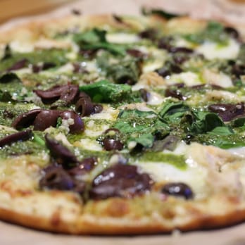 Blaze Pizza - Garlic Pesto. Basil. Spinach. Black and Kalamata Olives. Chicken. Feta. Parmesan. Chopped Garlic. Pesto Sauce. - Pizza Near Me - Riverside, California