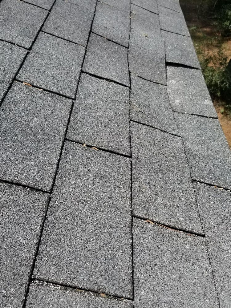 Slide of Quick Roofing