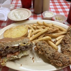 Sweet P’s Cafe - Cheeseburger and steak fingers with seasoned fries, garlic bread and gravy