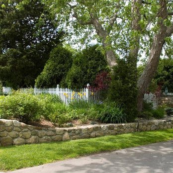 Grove Gardens Landscaping - a stone wall and a tree - Landscaping Near Me - Clinton, Connecticut Grove Gardens Landscaping - a stone wall and a tree - Landscaping Near Me - Clinton, Connecticut