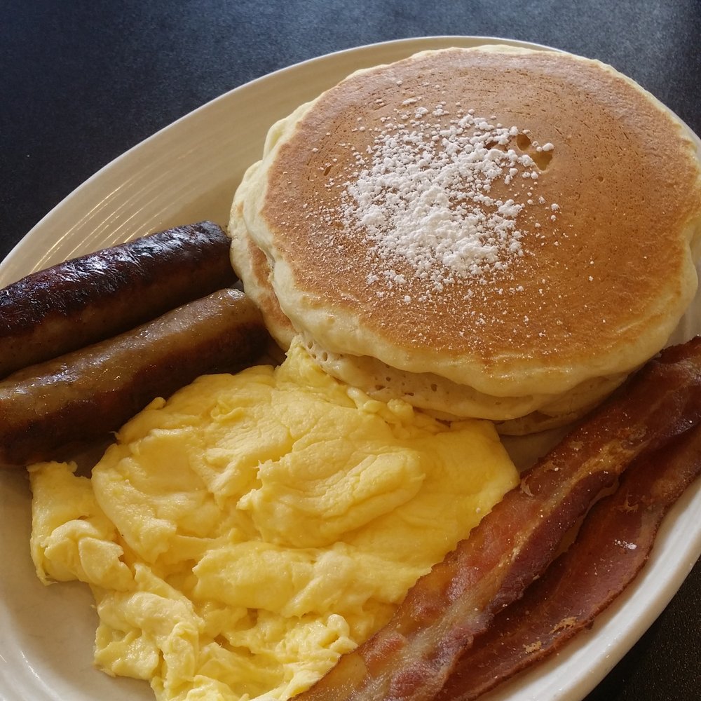 Stacked - Stacked special (eggs, bacon, sasauge) with pancakes. includes butter and maple syrup - Breakfast & Brunch Near Me - Oak Lawn, Illinois