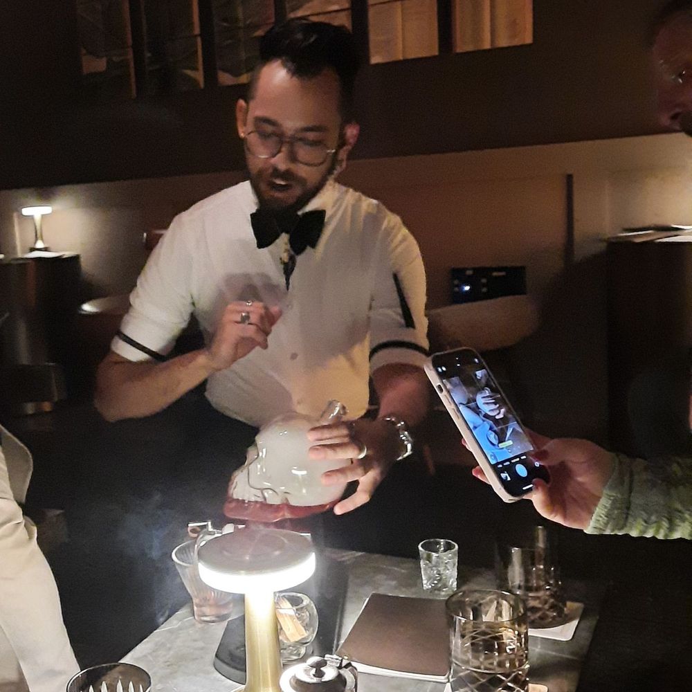 Bandista - Bartender with drink explanation - Cocktail Bars Near Me - Houston, Texas