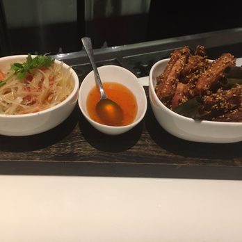 People's Palace - Fried chicken wings with som tom (spicy papaya salad) - Thai Near Me - Makati, NCR People's Palace - Fried chicken wings with som tom (spicy papaya salad) - Thai Near Me - Makati, NCR