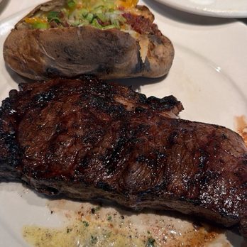 The Chop House - 14oz Ribeye loaded baked potato - Seafood Near Me - Madison, Alabama The Chop House - 14oz Ribeye loaded baked potato - Seafood Near Me - Madison, Alabama