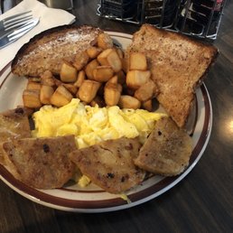 2 eggs scrambled with sausage and brown toast 2 eggs scrambled with sausage and brown toast