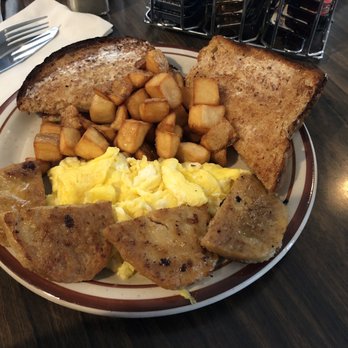 Restaurant Evangeline - 2 eggs scrambled with sausage and brown toast - Comfort Food Near Me - Chéticamp, Nova Scotia Restaurant Evangeline - 2 eggs scrambled with sausage and brown toast - Comfort Food Near Me - Chéticamp, Nova Scotia