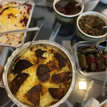 Herby Restaurant - a variety of dishes on a table - Persian/Iranian Near Me - Toronto, Ontario Herby Restaurant - a variety of dishes on a table - Persian/Iranian Near Me - Toronto, Ontario