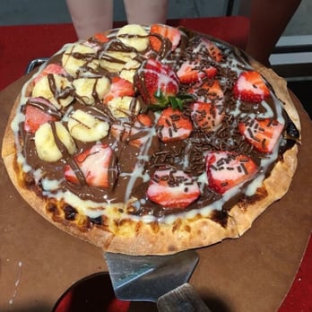 PieFection - One half a banana, strawberry and Nutella. The other half strawberry and brigadeiro. Yummyyy!!! - Pizza Near Me - Orlando, Florida PieFection - One half a banana, strawberry and Nutella. The other half strawberry and brigadeiro. Yummyyy!!! - Pizza Near Me - Orlando, Florida