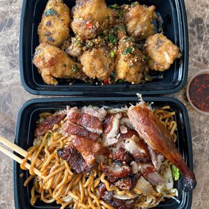 Photo of AA Kitchen - San Francisco, CA, United States. DELIVERY: Roast Duck "Garlic Noodles" ($15.75) + Salt & Pepper Wings ($9). The "garlic noodles" is chow mein.