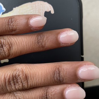 Flexi Nails & Spa - More plastic coming off from filing, but the dip & shape were good! - Nail Salons Near Me - Orlando, Florida