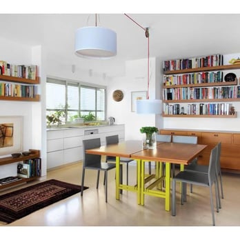 Corniel Construction - a dining room with bookshelves - General Contractors Near Me - New York, New York
