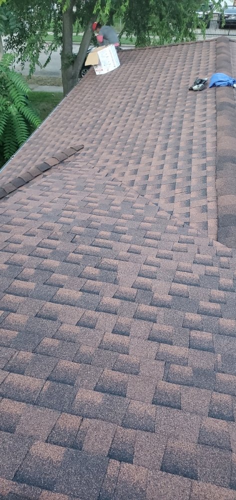 Slide of 2 Angels Roofing