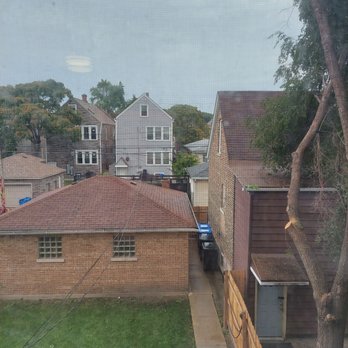 RG Tree - After: Clear of branches over the electrical and data lines - Tree Services Near Me