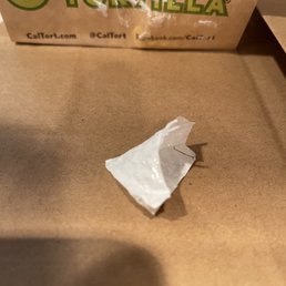 Piece of plastic that was in my burrito, YUCK!!!!'