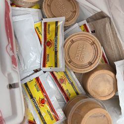 Raising Cane's Chicken Fingers - Bag full of sauce