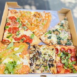 from top to bottom: margherita, buffalo chicken, romano, burata with pesto and vodka, mushroom and truffle oil, and grandma pepperoni from top to bottom: margherita, buffalo chicken, romano, burata with pesto and vodka, mushroom and truffle oil, and grandma pepperoni