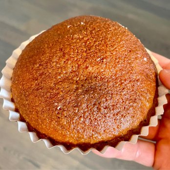 Paris Baguette - a hand holding a muffin - Coffee & Tea Near Me - Queens, New York Paris Baguette - a hand holding a muffin - Coffee & Tea Near Me - Queens, New York