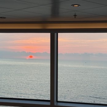 Norwegian Cruise Line - Sunset from buffet on Norwegian Bliss - Travel Services Near Me - San Pedro, California Norwegian Cruise Line - Sunset from buffet on Norwegian Bliss - Travel Services Near Me - San Pedro, California